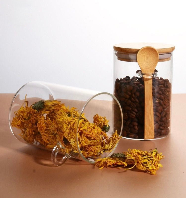Elegant Spice Jar With A Wooden Spoon